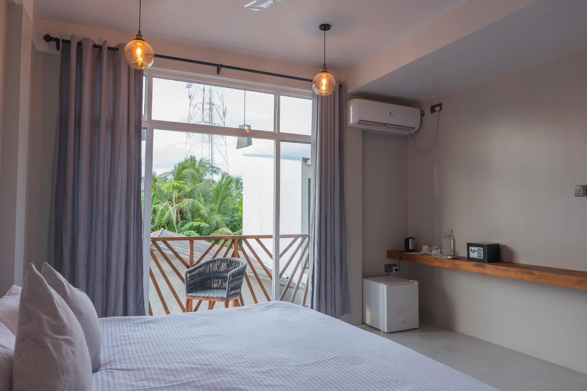 The Palm Ray Rasdhoo Bed & Breakfast Exterior photo